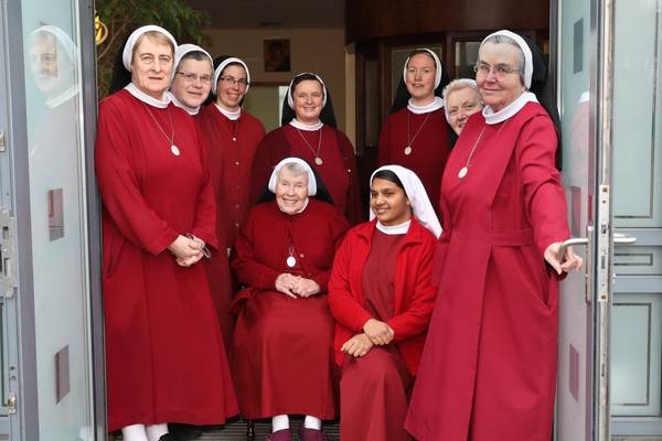 Keeping their distance: Enclosed nuns attract followers via online Mass