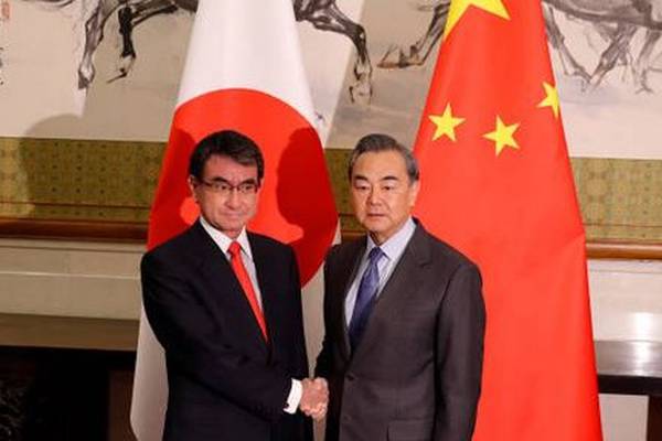 China urges Japan to work with it to improve strained relations