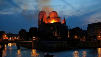 France sees Notre-Dame fire as a parable for Covid-19 pandemic