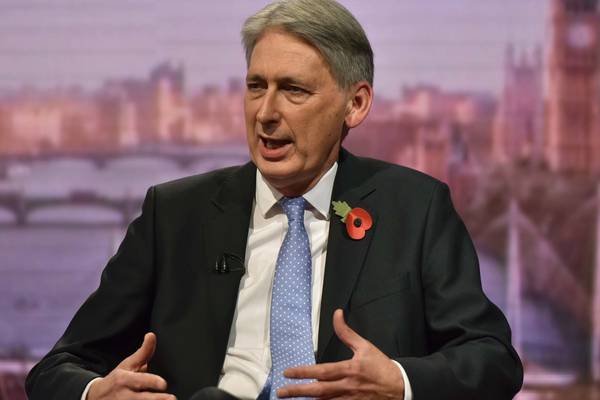 Hammond warns Brexit rebels not to risk easing of austerity