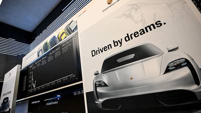 Porsche rises in landmark IPO weathering tough markets