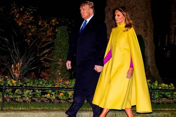 Melania Trump wows in a canary yellow cape – but who is it a dig at?