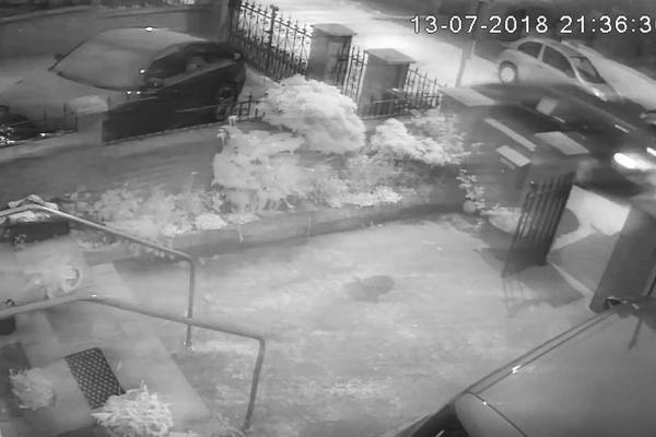 Attackers threw device from moving car at home of Gerry Adams, CCTV reveals