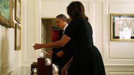 Obama marks anniversary with candles at White House