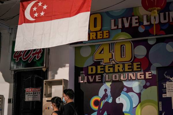 Karaoke lounge outbreak forces Singapore to tighten Covid restrictions