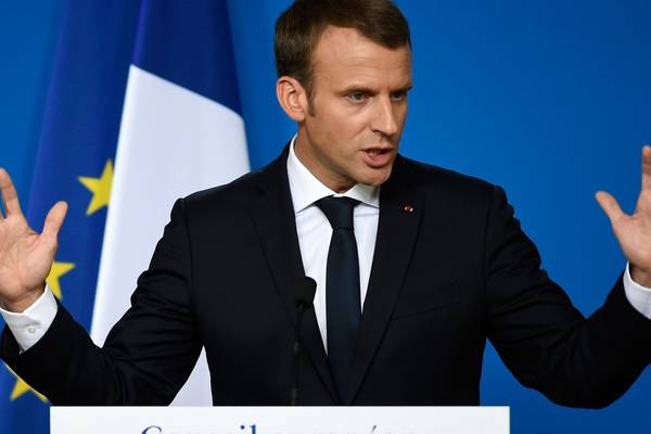 Macron says work on Brexit bill is not even half done
