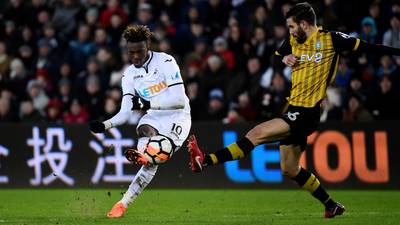 Swansea into FA Cup last eight after replay win