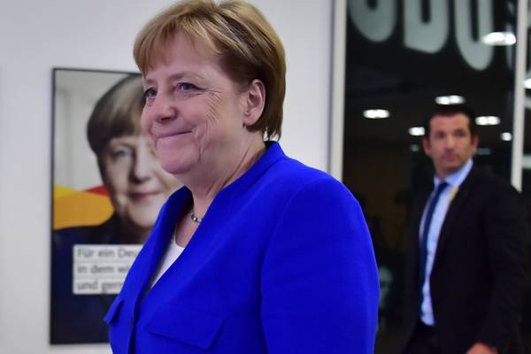 Merkel and Bavarian allies thrash out migration compromise
