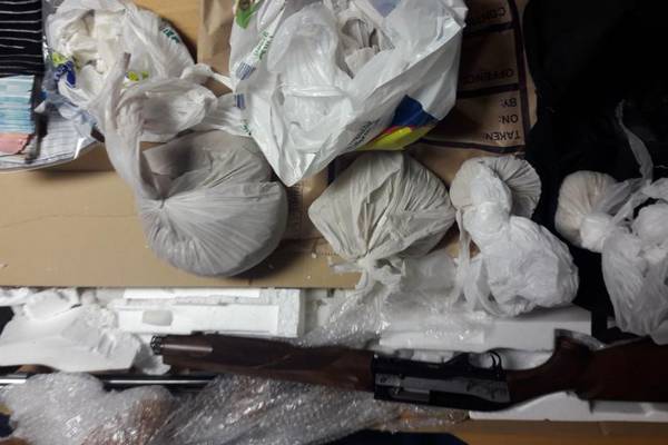 Shotgun, drugs and sum of cash seized by gardaí in Dublin