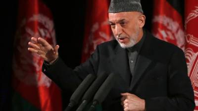 Afghanistan’s Karzai goes to Qatar to discuss peace with Taliban