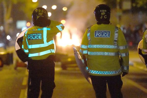 Six police officers injured during clashes with protesters in London