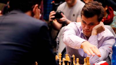 Magnus Carlsen retains his world chess crown