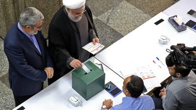 Iran’s hardliners head for sweeping victory as voters stay away