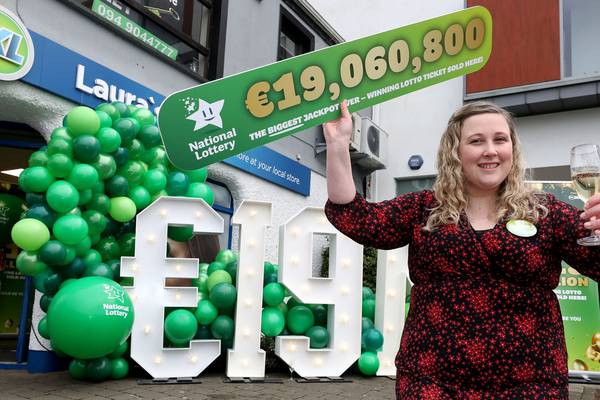 ‘It’s impossible to explain’: Winners of record €19m Lotto jackpot claim their prize