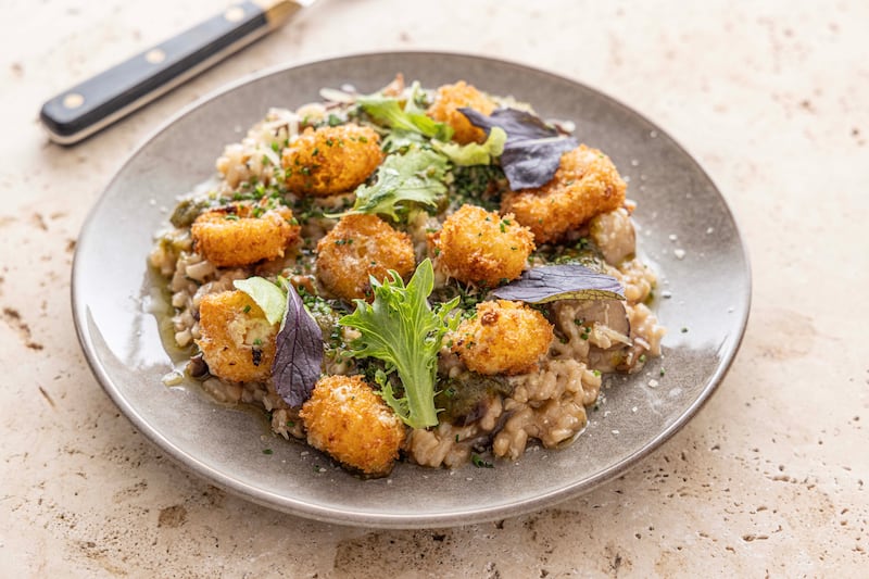 Wild mushroom risotto with crispy Cheddar. Photograph: Harry Weir Photography