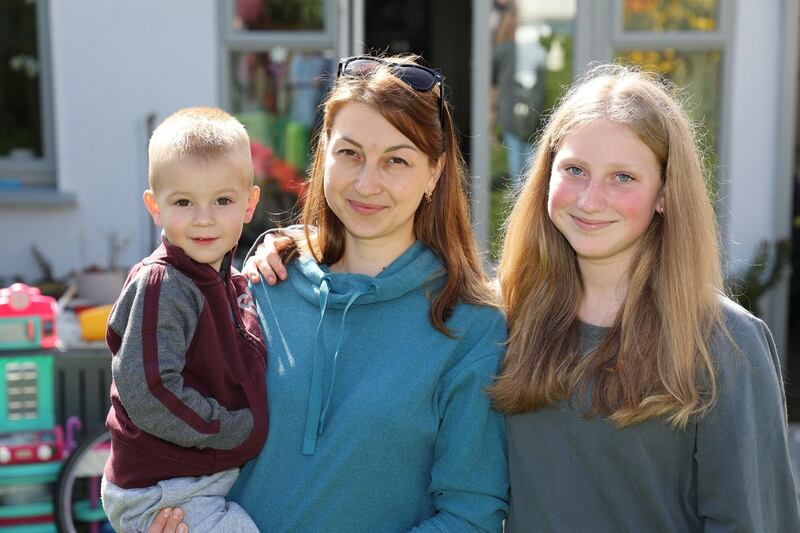 Daryna Fedorenko with  her children Sasha (2) and Vika (12). Photograph:  Nick Bradshaw