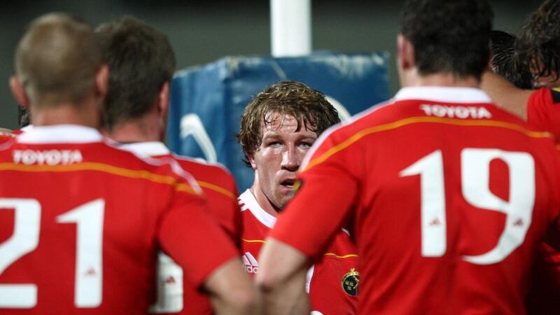 Jerry Flannery speaks to his Munster teammates during a match against Leinster in 2009. Photograph: Billy Stickland/Inpho