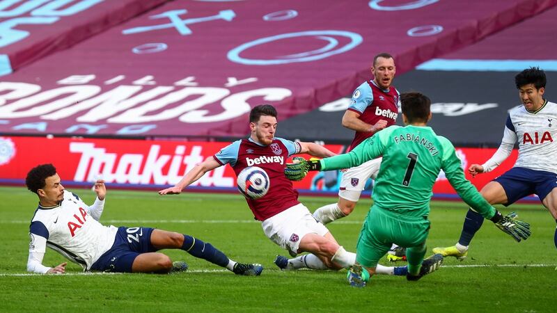 Fabianski blocks a shot from Dele Alli. Photo: Clive Rose/EPA