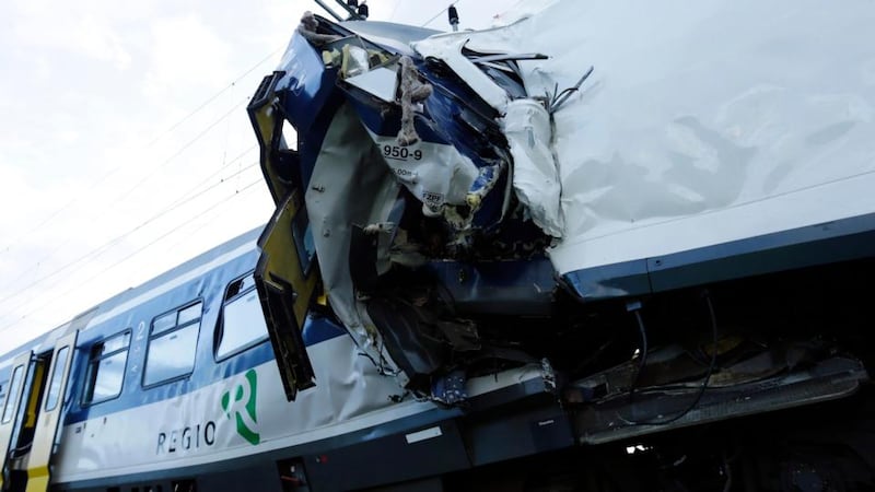 A view of the scene where two Swiss regional trains collided head on near Granges-Pres-Marnand near Payerne in western Switzerland. Photograph: Denis Balibouse/Reuters.