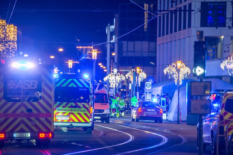 Emergency services at the scene of the attack on Friday night. Photograph: Craig Stennett/Getty Images