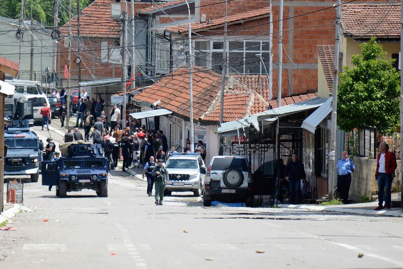 This photograph taken on June 13th last shows Kosovan police officers patrolling a street after clashes with ethnic Serbs as tensions erupted after police arrested a suspected leader of a Serb paramilitary group in the flashpoint city of Mitrovica, north Kosovo. Photograph: AFP/Getty