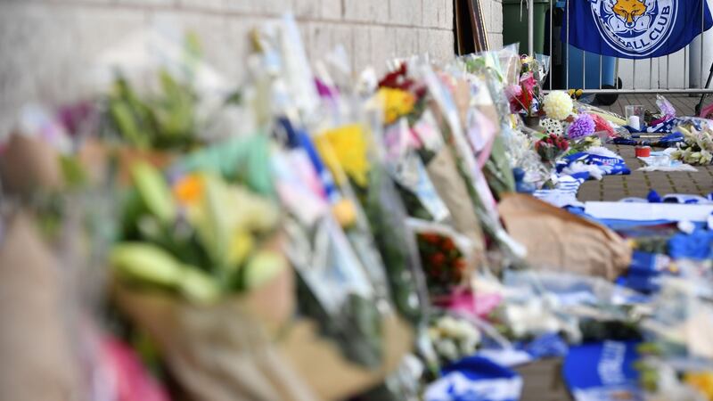 A picture shows tributes outside Leicester City Football Club’s King Power Stadium. Photograph: Ben Stansall/AFP/Getty Images