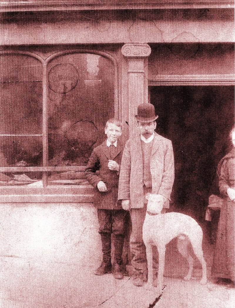 John and Pierce Walsh outside the tailor's shop in the early 20th century. Photograph appeared in New Ross Remembers by Seán Crowley