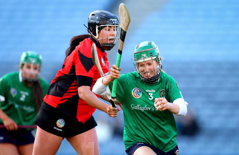 Oulart The Ballagh’s Una Leacy and Laura Ward of Sarsfields. Photograph: Ryan Byrne/Inpho