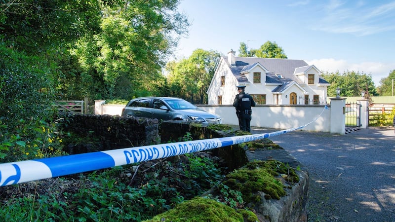 The laneway where Quinn Industrial Holdings director Kevin Lunney was abducted is cordoned off by  PSNI officers. Photograph: Ronan McGrade/Pacemaker Press