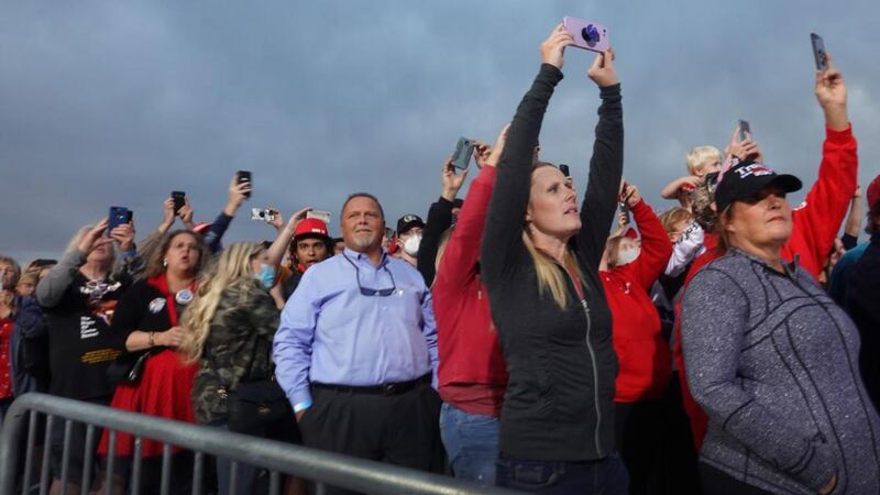 Supporters take pictures as Donald Trump arrives for a rally at Des Moines International Airport  in Iowa. Photograph: Scott Olson/Getty Images