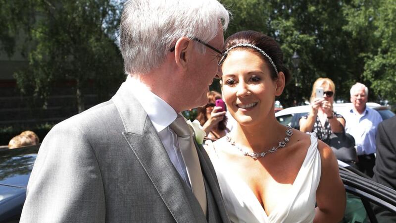 Laura Priestley accompanied by her dad Maurice arriving at Holy Trinity Abbey Church for her wedding to Jonathan Sexton. Photograph: Liam Burke/Press 22