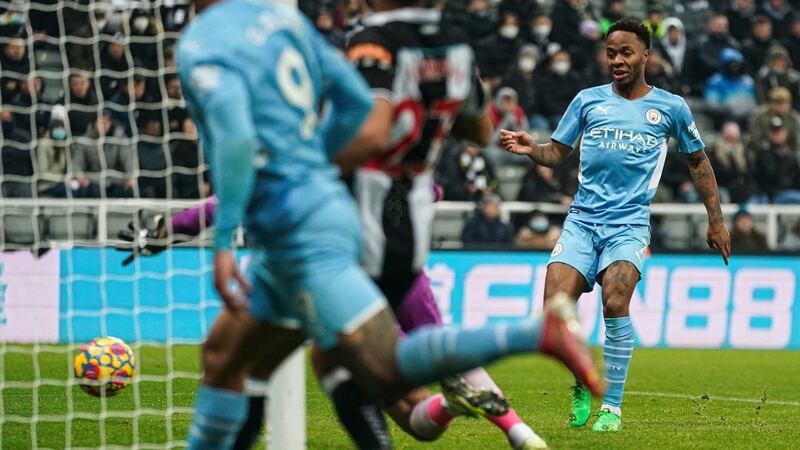 Raheem Sterling taps home Man City’s fourth. Photo: Owen Humphreys/PA Wire