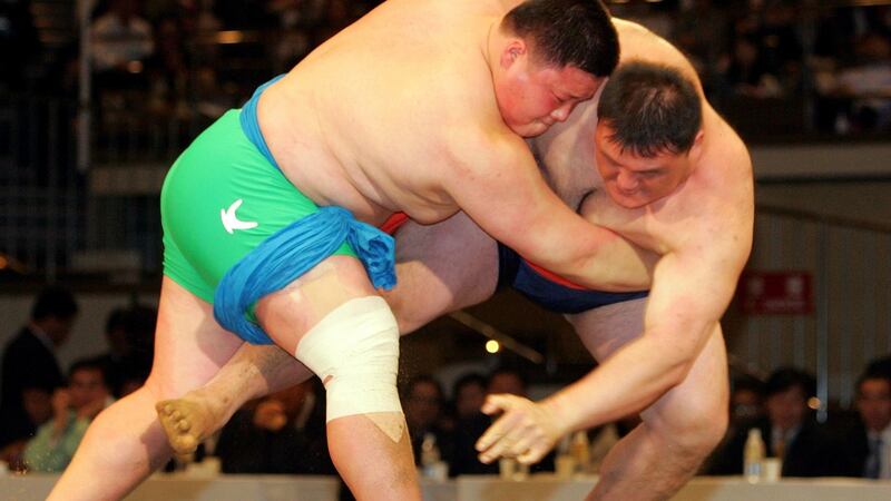 South Korea’s ssireum wrestler Park Young-Bae (left) beats champion Kim Kyung-Soo during at an exhibition match at Ryogoku Kokugikan in Tokyo in 2005. File photograph: Yuriko Nakao/Reuters