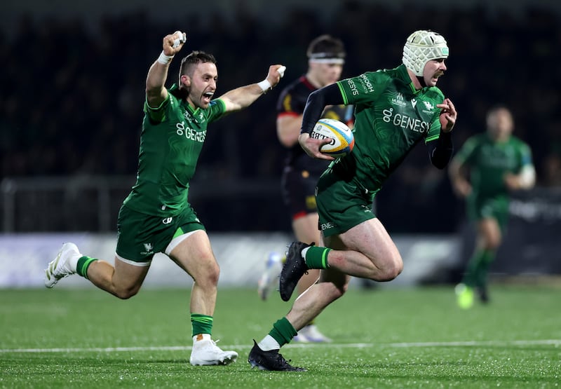 Mack Hansen scores a try for Connach as Caolin Blade celebrates. Photograph: James Crombie/Inpho