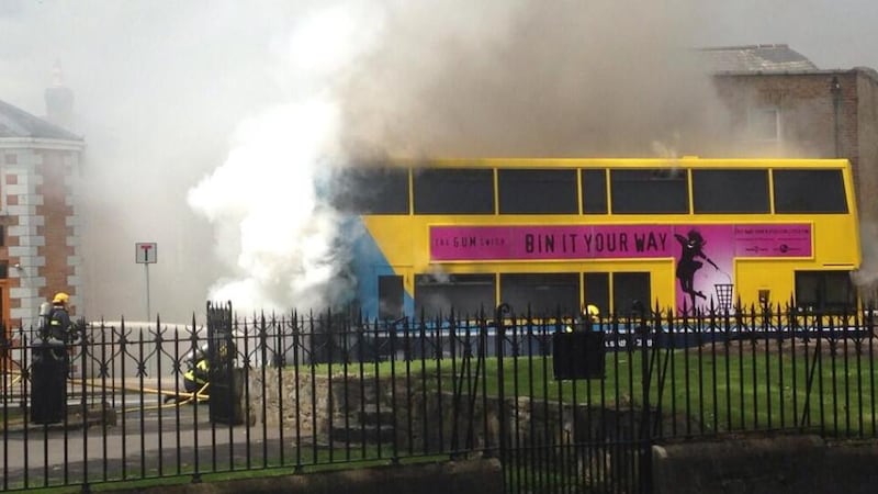 Firefighters at the scene of a burning Dublin Bus vehicle on the Harold’s Cross Rd in Dublin this afternoon. Photograph: @Psycrow via Twitter