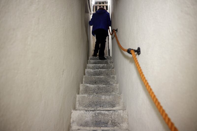 Richard climbs the stairs of the cathedral's bell tower. Photograph: Chris Maddaloni