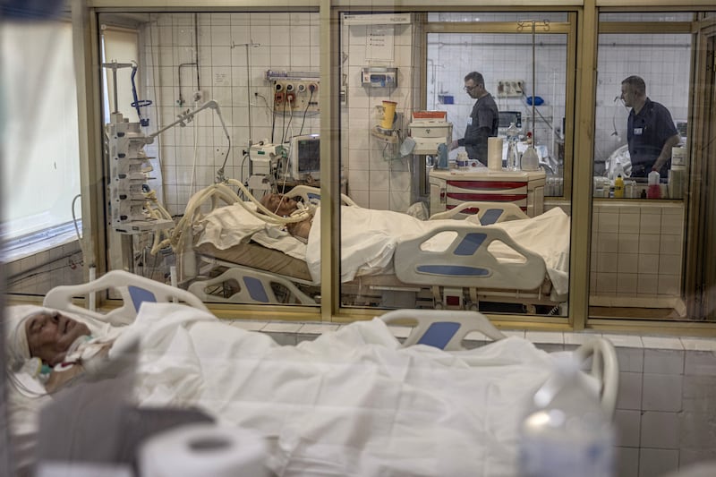 Ukrainian soldiers with head injuries caused by explosions in an ICU ward at the Mechnikov Hospital. Photograph: Finbarr O’Reilly/New York Times