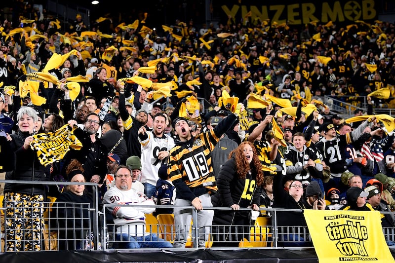 Pittsburgh Steelers fans waving terrible towels during the second half of a game against Chicago Bears in Pittsburgh, Pennsylvania. Photograph: Emilee Chinn/Getty Images