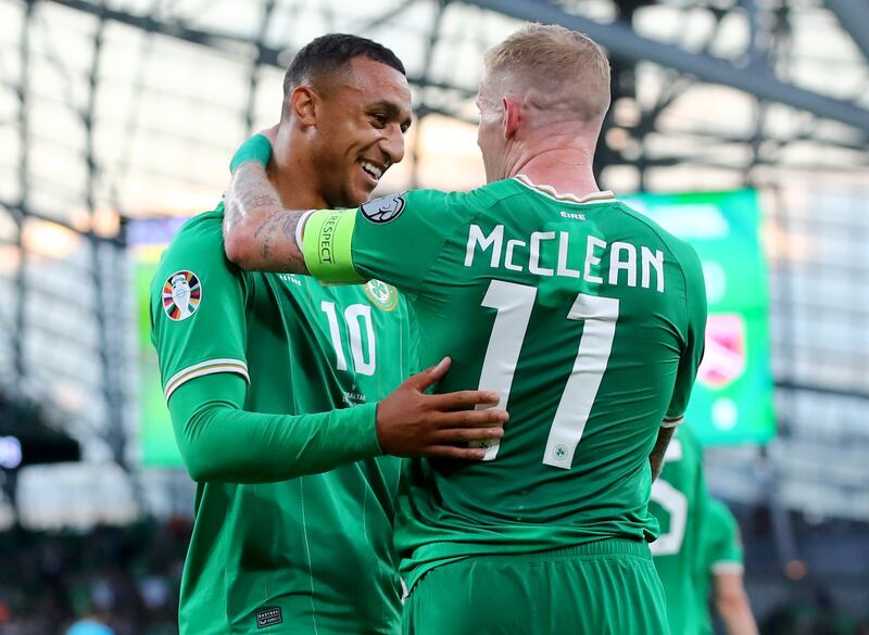 Ireland’s Adam Idah celebrates scoring his side’s third goal with captain James McClean. Photograph: James Crombie/Inpho