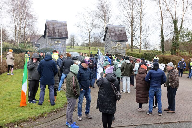 Protesters gather at the gates of the Moyvalley Hotel and Golf Resort. Photograph: Dara Mac Dónaill/The Irish Times








