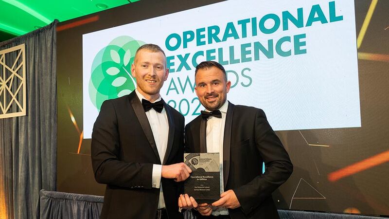 Neil Wall, community director at Business River presents the operational excellence in utilities to David Gilloughley, Gas Networks Ireland