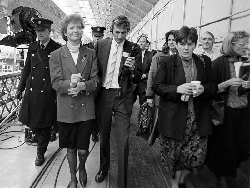 Mary Robinson with advisers Brenda O'Hanlon (far right) and advisor Bride Rosney (second from the right) at the count centre in the RDS in Dublin at the moment it became clear she had won the presidential election. Behind them is young Labour Party member Joan Burton. Photograph: Eamonn Farrell/RollingNews.ie