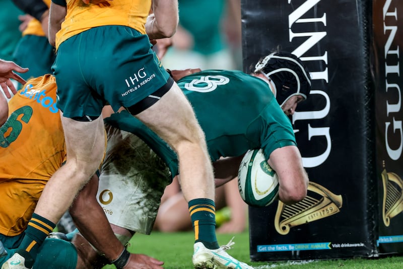 Ireland's Caelan Doris scores a try against Australia. Photograph: Billy Stickland/Inpho