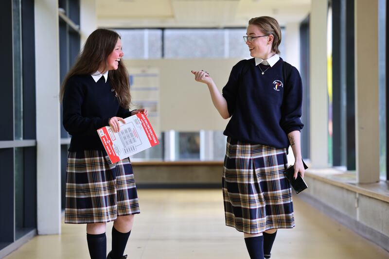 Students Katie Trappe and Jasmin Higgins, after the Leaving Cert Irish exam at Trinity Comprehensive School, Ballymun, Dublin.
Photograph: Dara Mac Dónaill








