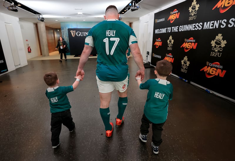 Cian Healy  with his sons Russell and Beau at the Aviva Stadium. Photograph: Dan Sheridan/Inpho 