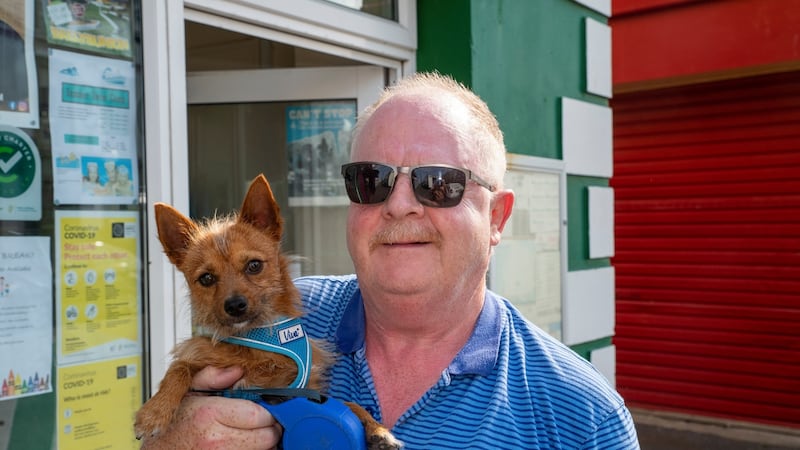 Ger Cotter and his dog, Guss, at Ballybunion tourist office. Photograph: Domnick Walsh