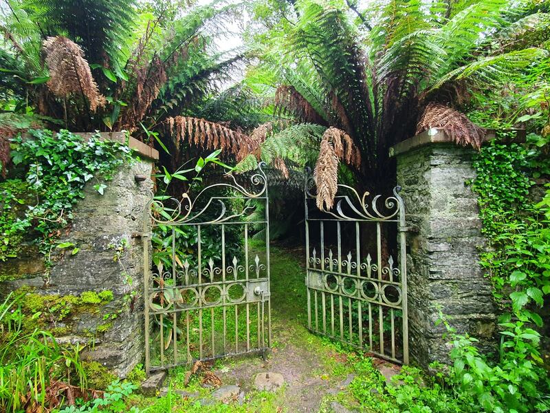 The wrought-iron entrance gates.