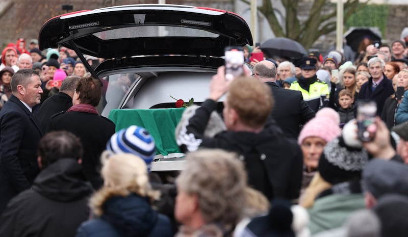 The hearse carrying Shane MacGowan's coffin arrives at St Mary of the Rosary Church in Nenagh. Photograph: Laura Hutton