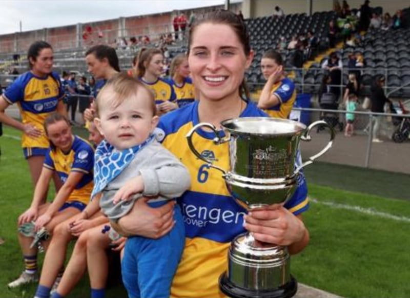 Clare intermediate captain Caoimhe Harvey with her baby Rían.