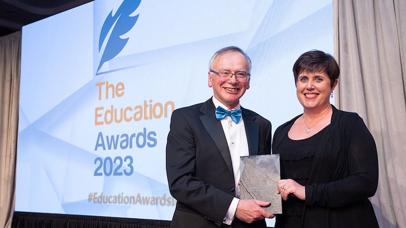 Willie Donnelly, judging co-ordinator, presents the Excellence in Education by a Professional Body award to Joanne Keane, LIA 